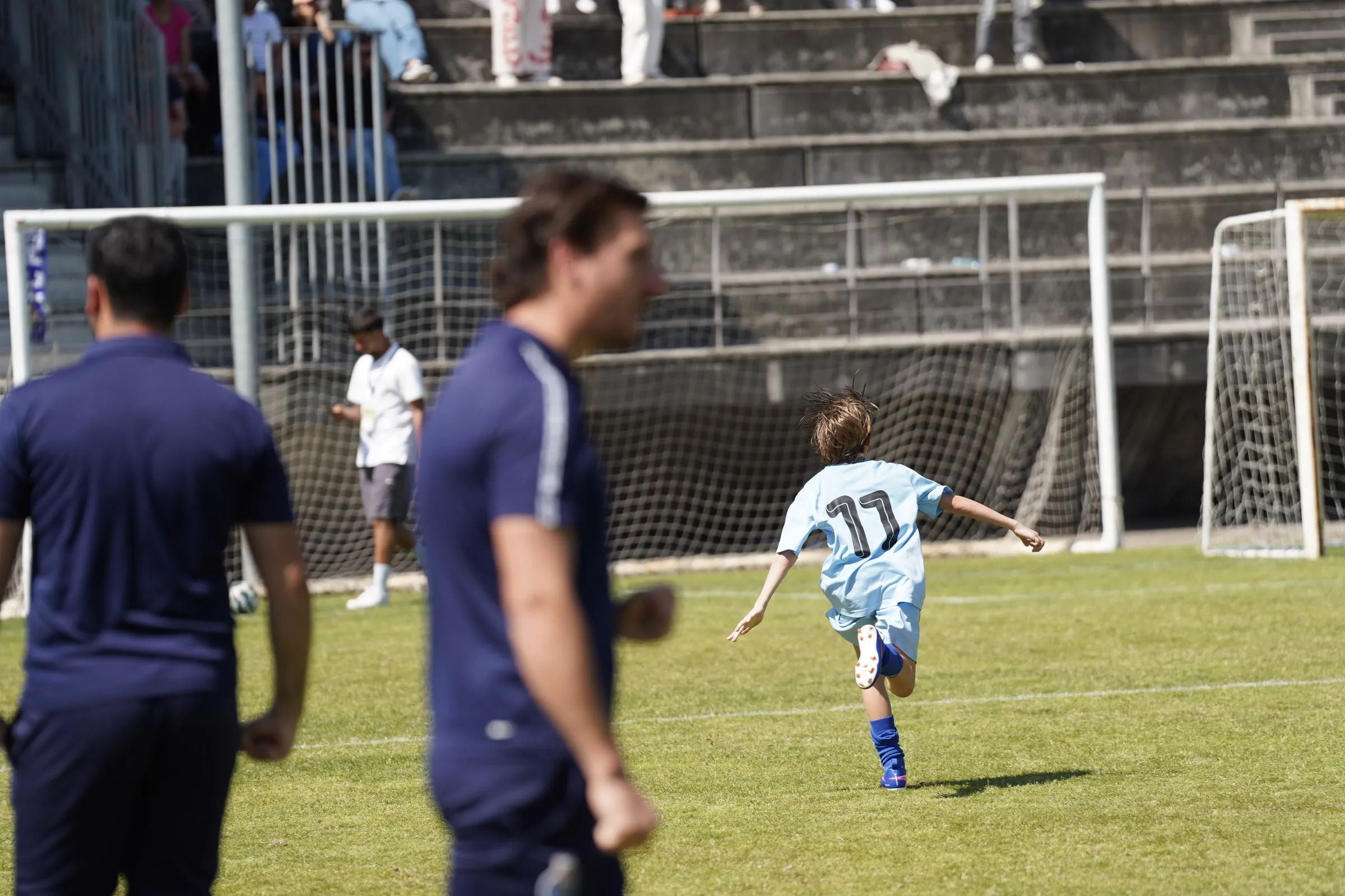 Young players compete for the ball.