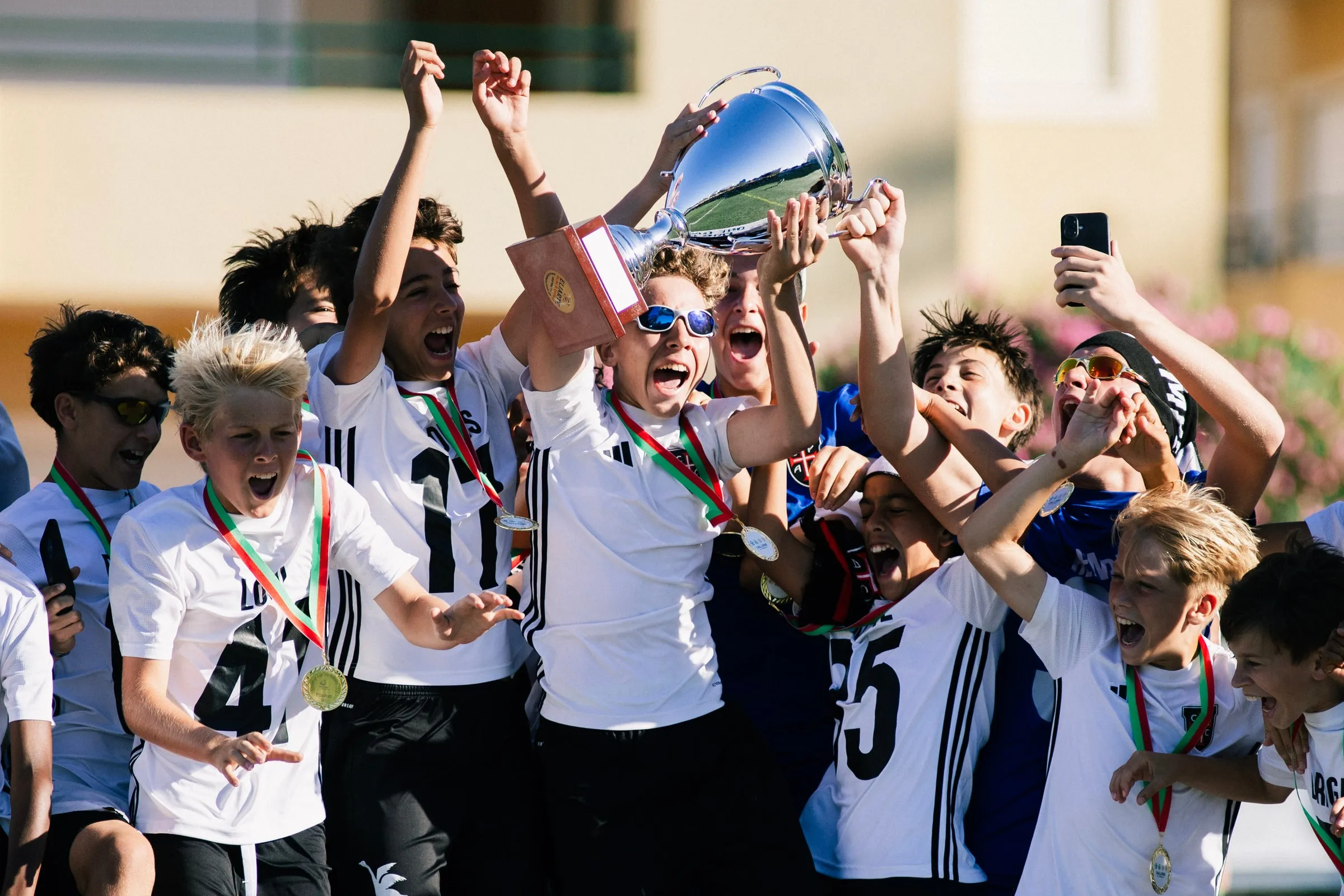 The trophy and the emotion of competition.